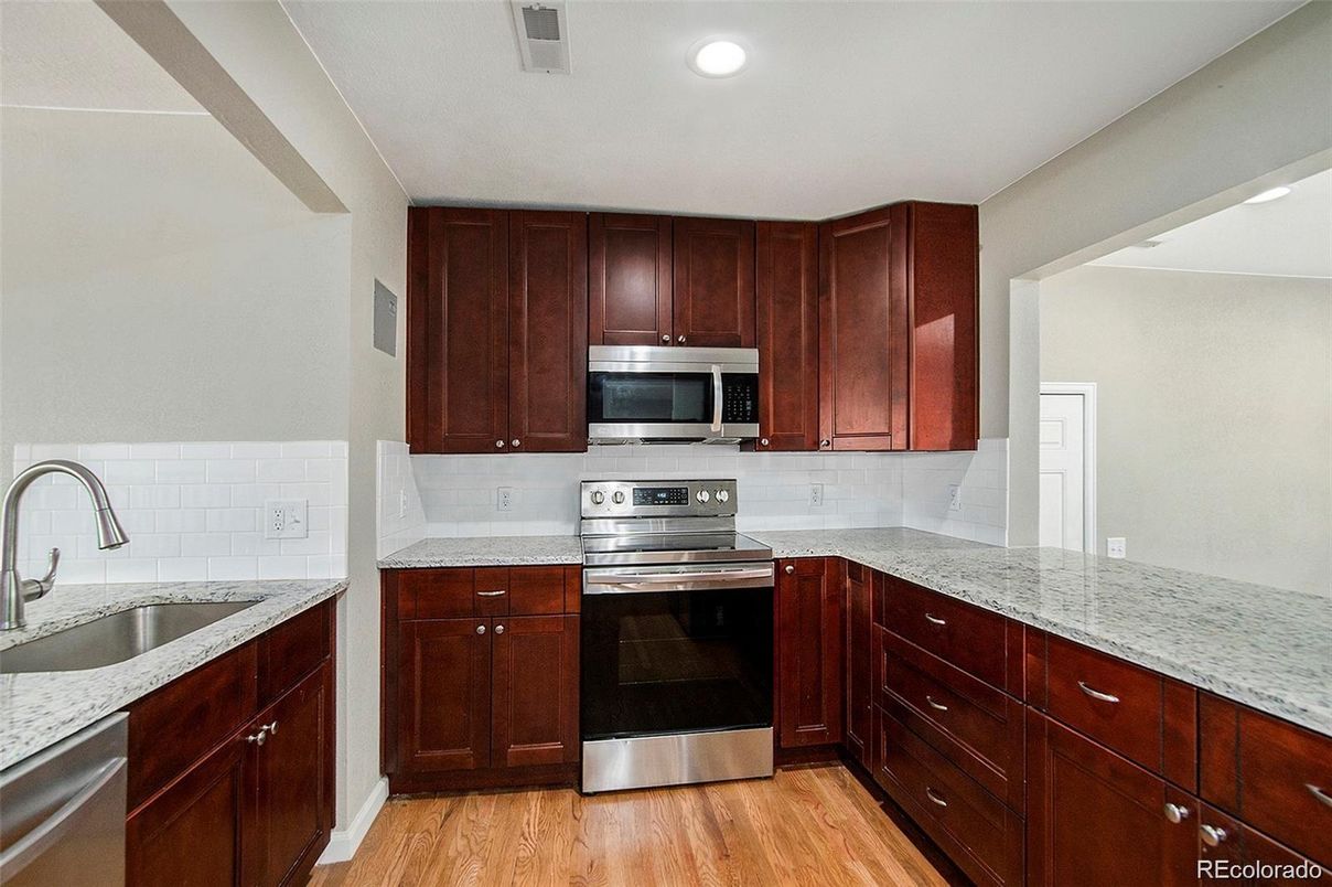 Interior, Kitchen, Recessed Lighting, Stainless Steel Appliances, Wood Texture Flooring