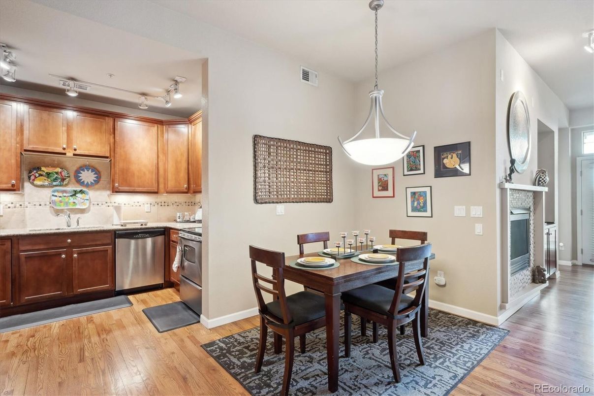 Dining room, Interior, Kitchen, Pendant Lights, Stainless Steel Appliances, Wood Texture Flooring