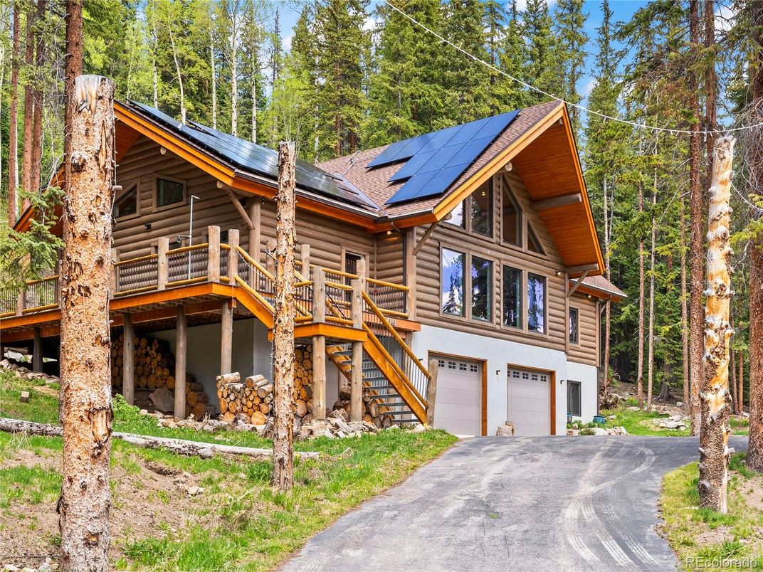 Attached, Exterior, Facade, Solar Panels, Log Home