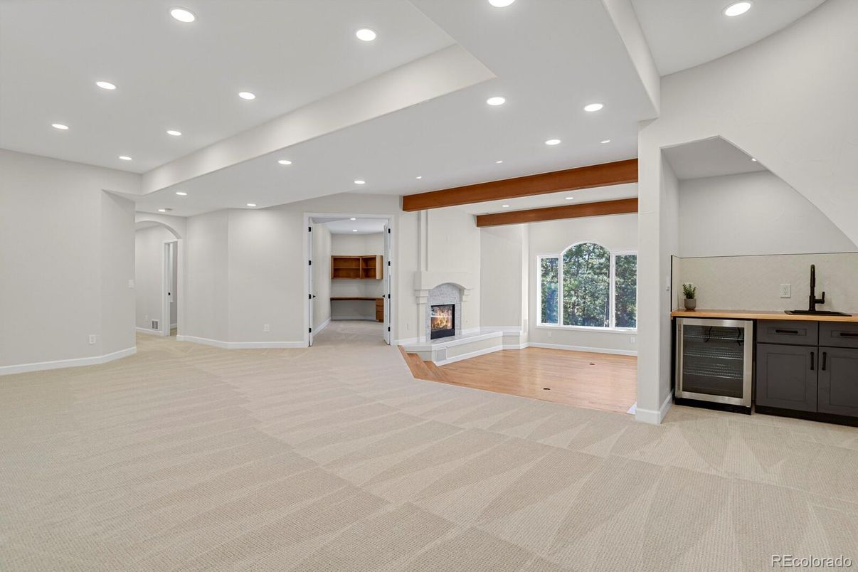 Empty room, Fireplace, Interior, Recessed Lighting, Wooden Beams