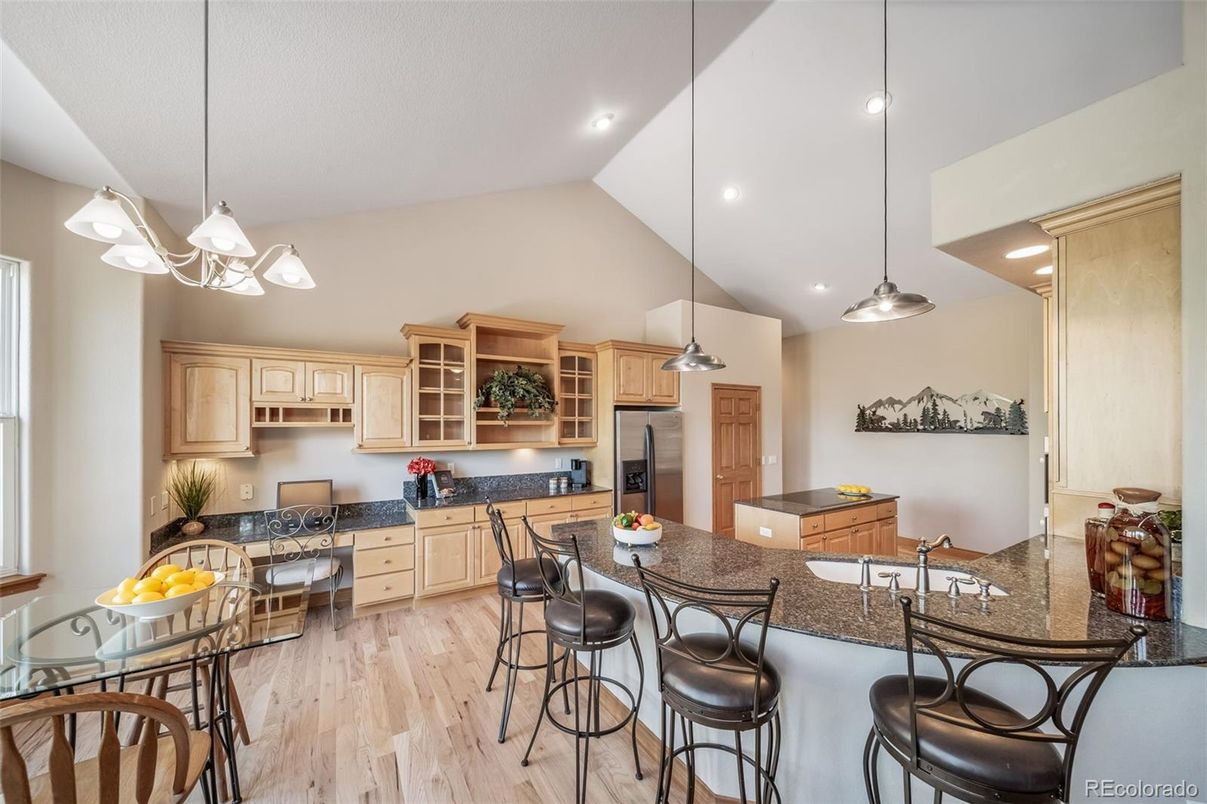 Dining room, Interior, Kitchen, Pendant Lights, Recessed Lighting, Stainless Steel Appliances, Wood Texture Flooring