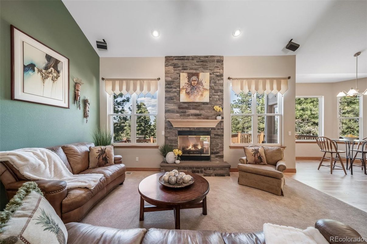 Dining room, Fireplace, Interior, Living room, Pendant Lights, Recessed Lighting, Stone Walls, Wood Texture Flooring