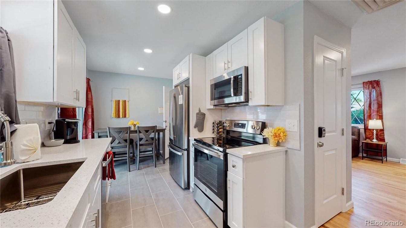 Dining room, Interior, Kitchen, Recessed Lighting, Stainless Steel Appliances, Wood Texture Flooring