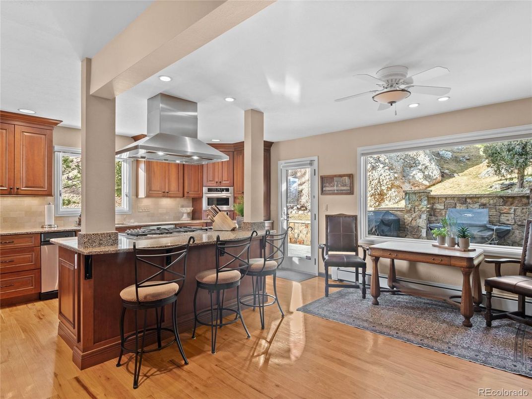 Dining room, Interior, Kitchen, Recessed Lighting, Stainless Steel Appliances, Wood Texture Flooring