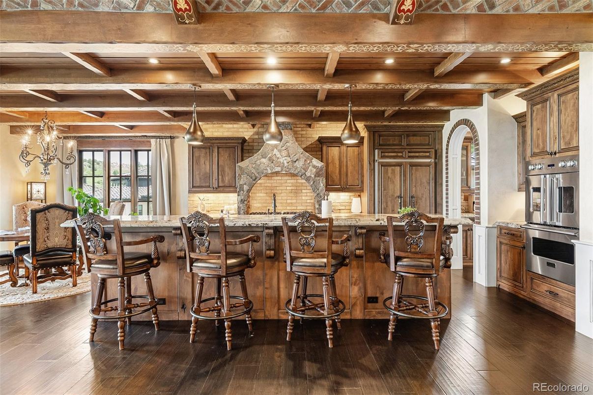 Chandelier, Dining room, Interior, Kitchen, Pendant Lights, Stainless Steel Appliances, Wooden Beams, Wooden Ceilings, Wood Texture Flooring