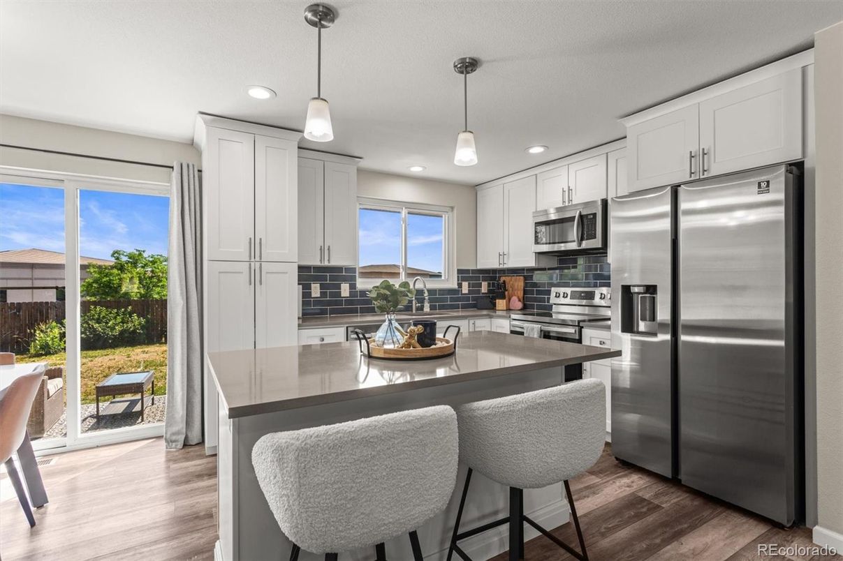 Interior, Kitchen, Pendant Lights, Recessed Lighting, Stainless Steel Appliances, Wood Texture Flooring