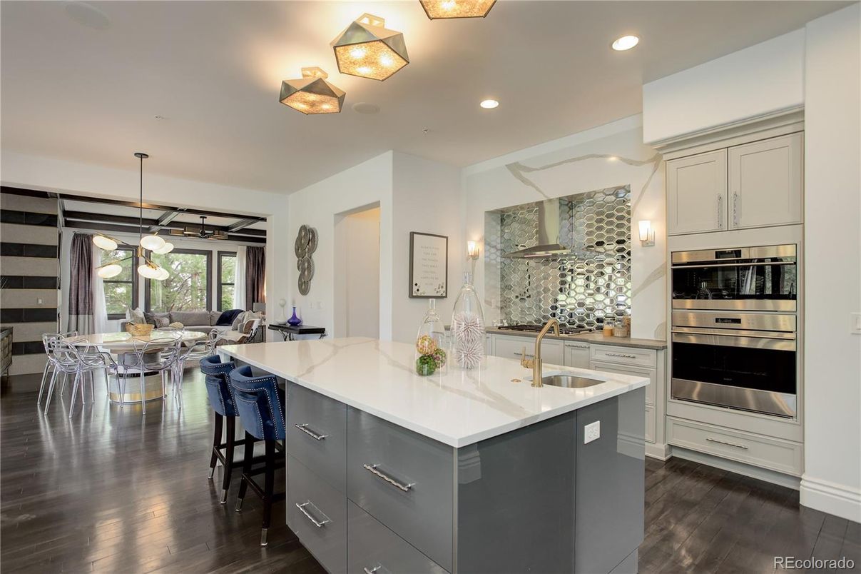 Dining room, Interior, Kitchen, Pendant Lights, Recessed Lighting, Stainless Steel Appliances, Wood Texture Flooring