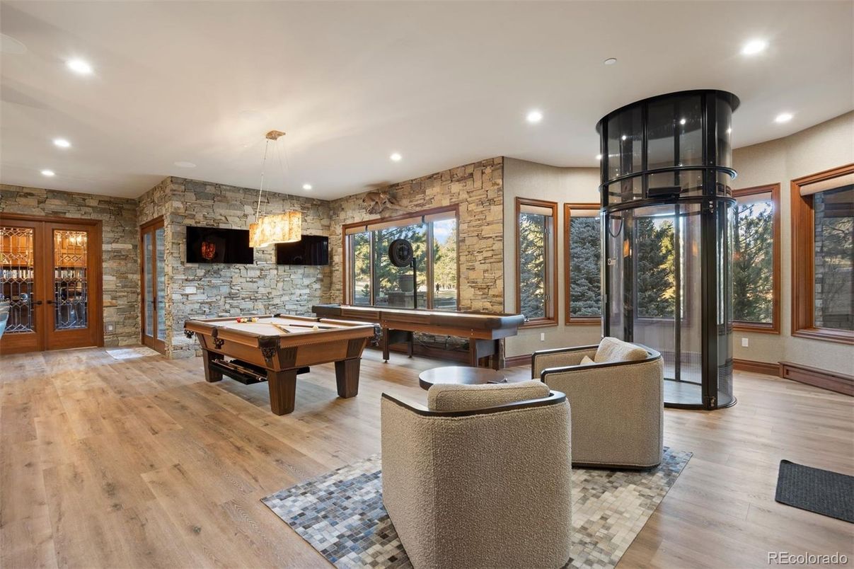 Billiard Table, Game Room, Interior, Pendant Lights, Recessed Lighting, Stone Walls, Wood Texture Flooring