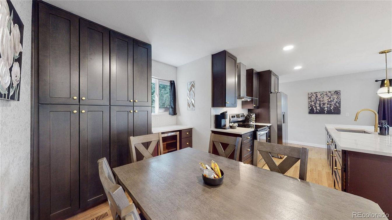 Dining room, Interior, Kitchen, Pendant Lights, Recessed Lighting, Stainless Steel Appliances, Wood Texture Flooring