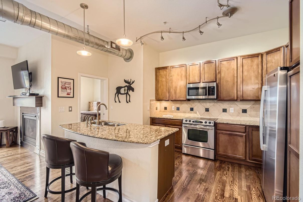 Fireplace, Interior, Kitchen, Pendant Lights, Stainless Steel Appliances, Wood Texture Flooring