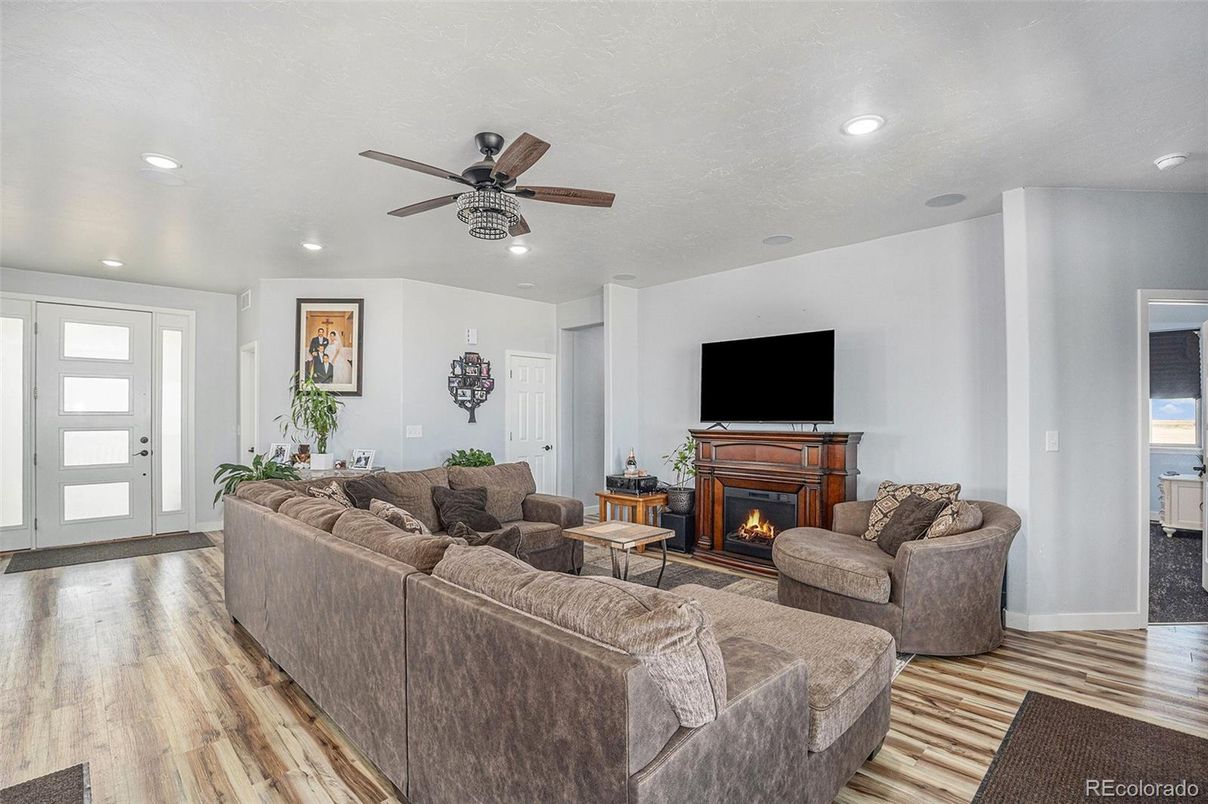 Fireplace, Interior, Living room, Recessed Lighting, Wood Texture Flooring