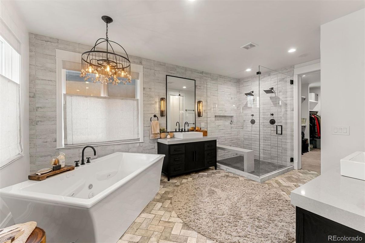 Bathroom, Dual Sink Vanities, Free Standing Baths, Glass Shower, Interior, Pendant Lights, Recessed Lighting, Stone Walls