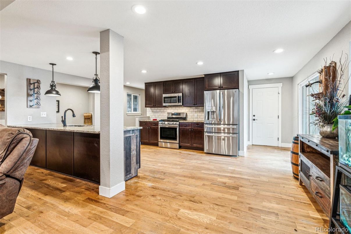 Interior, Kitchen, Pendant Lights, Recessed Lighting, Stainless Steel Appliances, Wood Texture Flooring