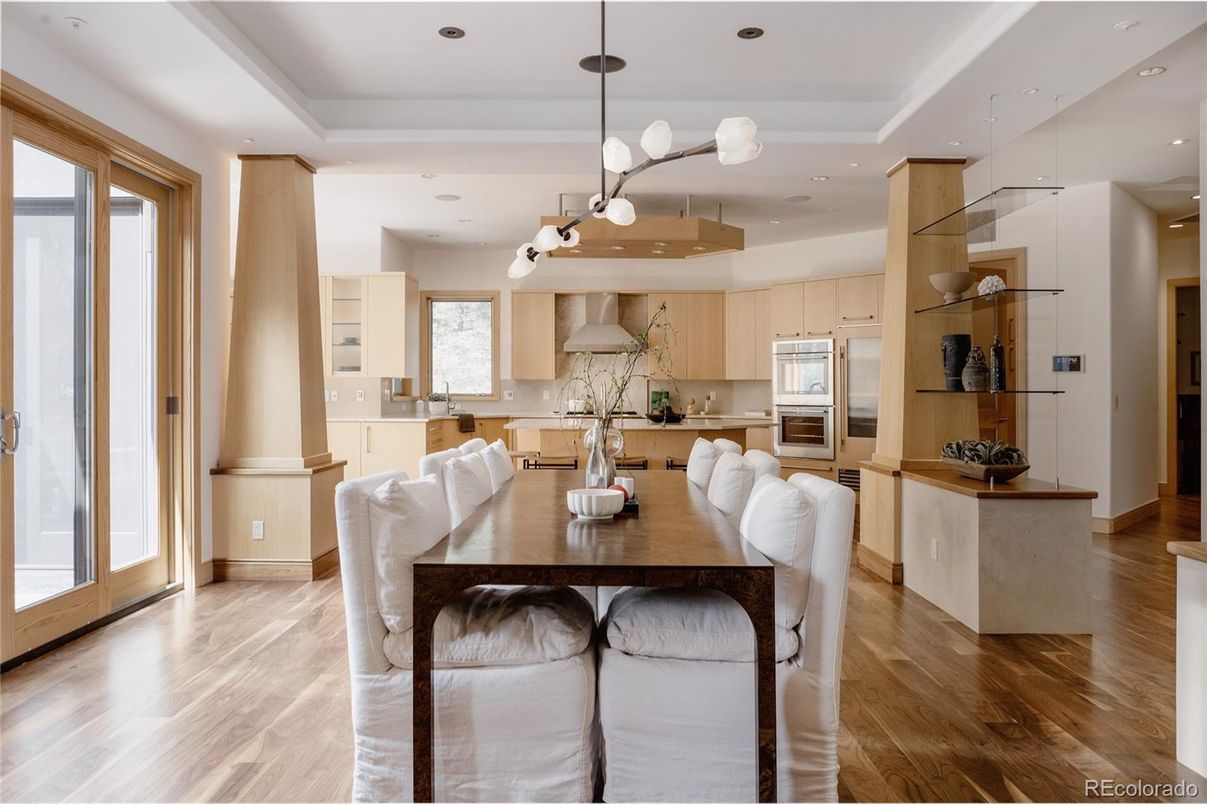 Dining room, Interior, Kitchen, Pendant Lights, Recessed Lighting, Stainless Steel Appliances, Wood Texture Flooring