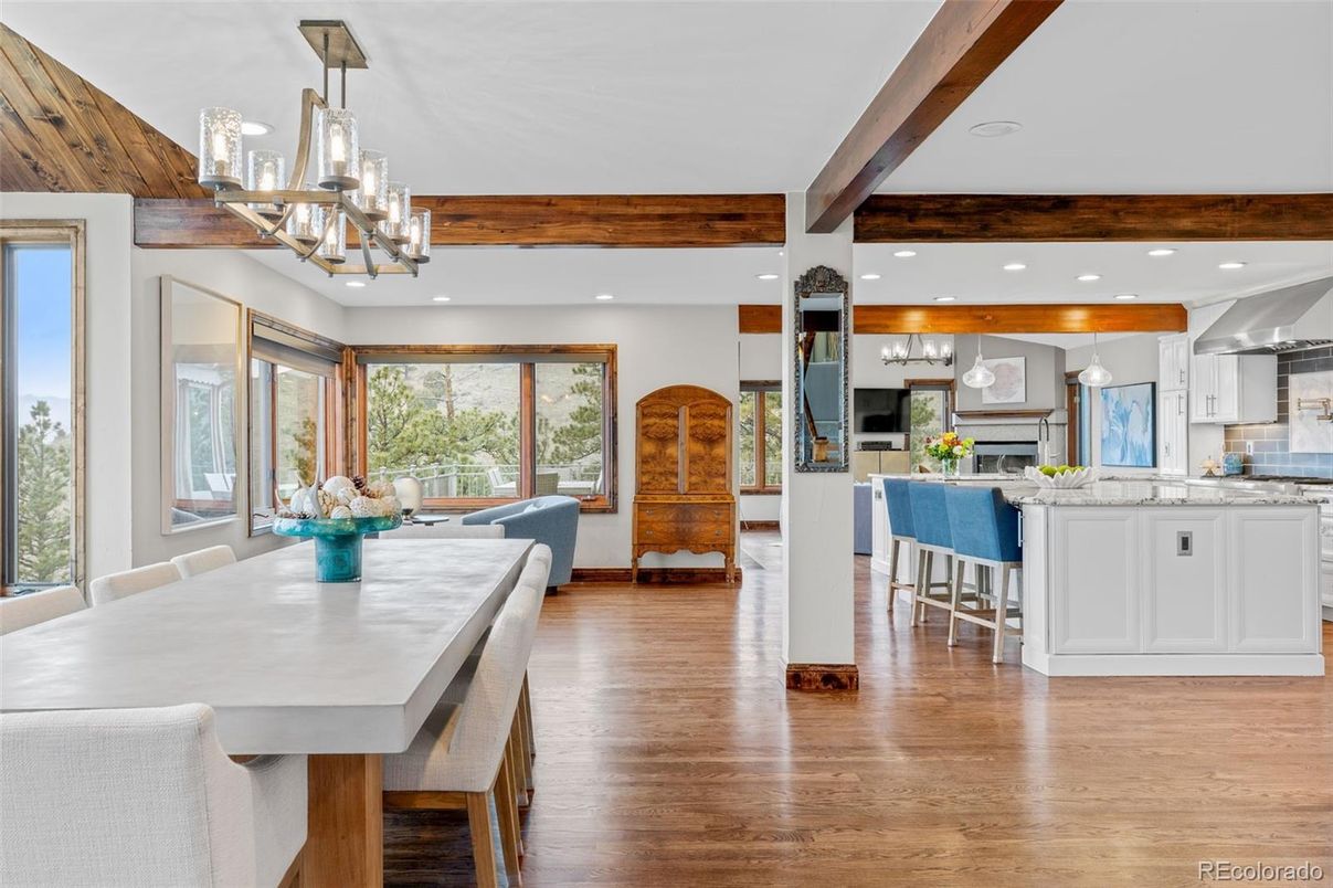 Chandelier, Dining room, Interior, Kitchen, Pendant Lights, Recessed Lighting, Stainless Steel Appliances, Wooden Beams, Wood Texture Flooring