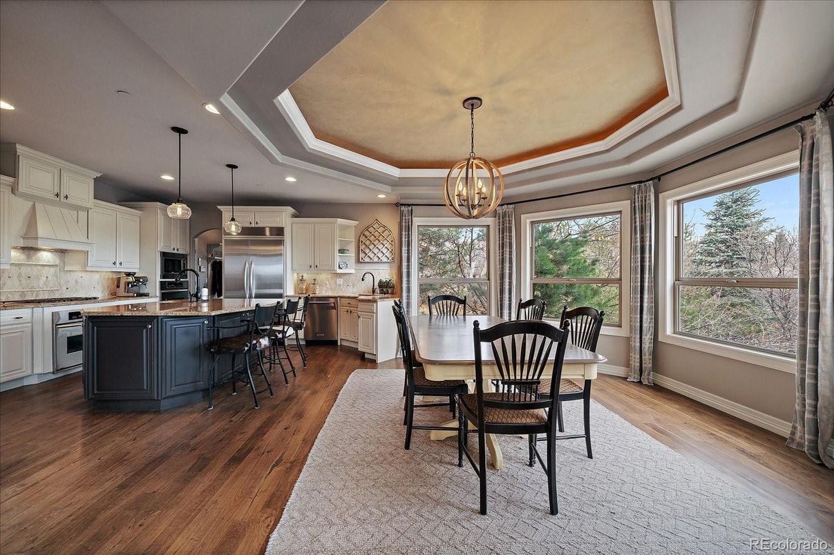 Dining room, Interior, Kitchen, Pendant Lights, Recessed Lighting, Stainless Steel Appliances, Wood Texture Flooring
