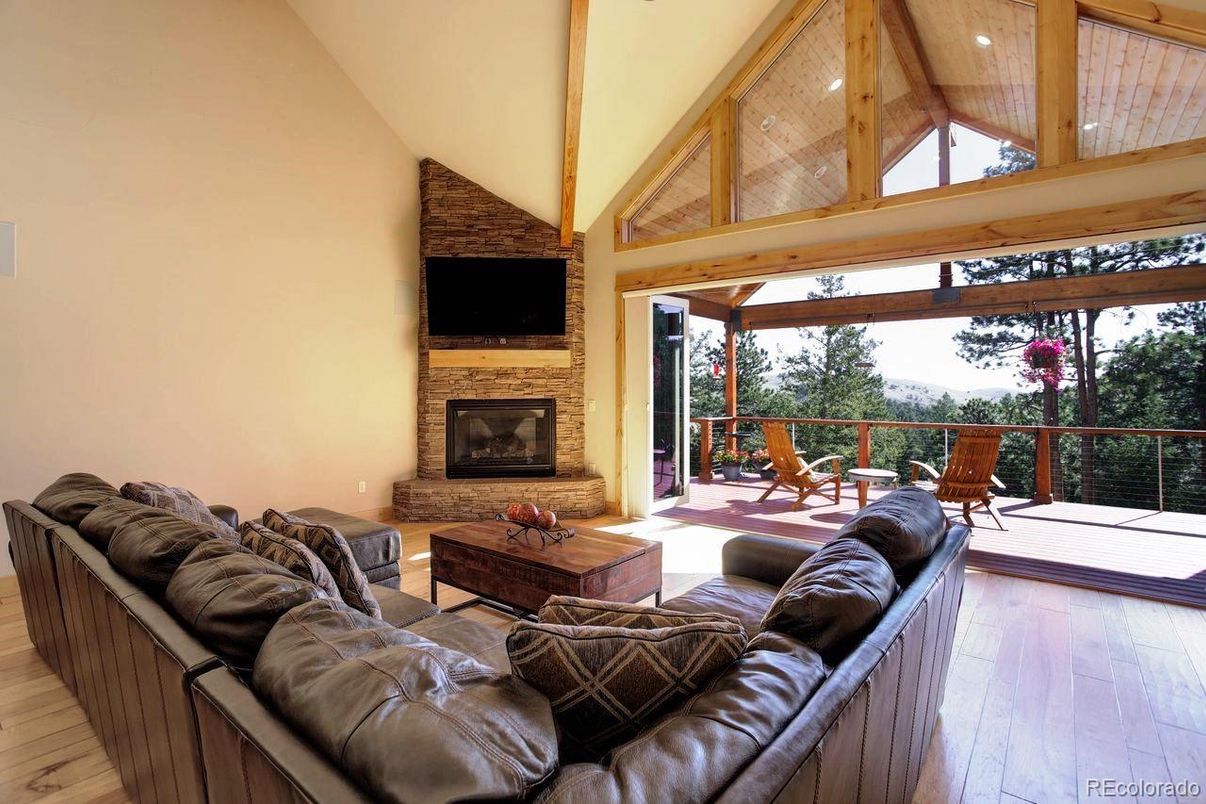 Fireplace, Interior, Living room, Recessed Lighting, Stone Walls, Wooden Ceilings, Wood Texture Flooring