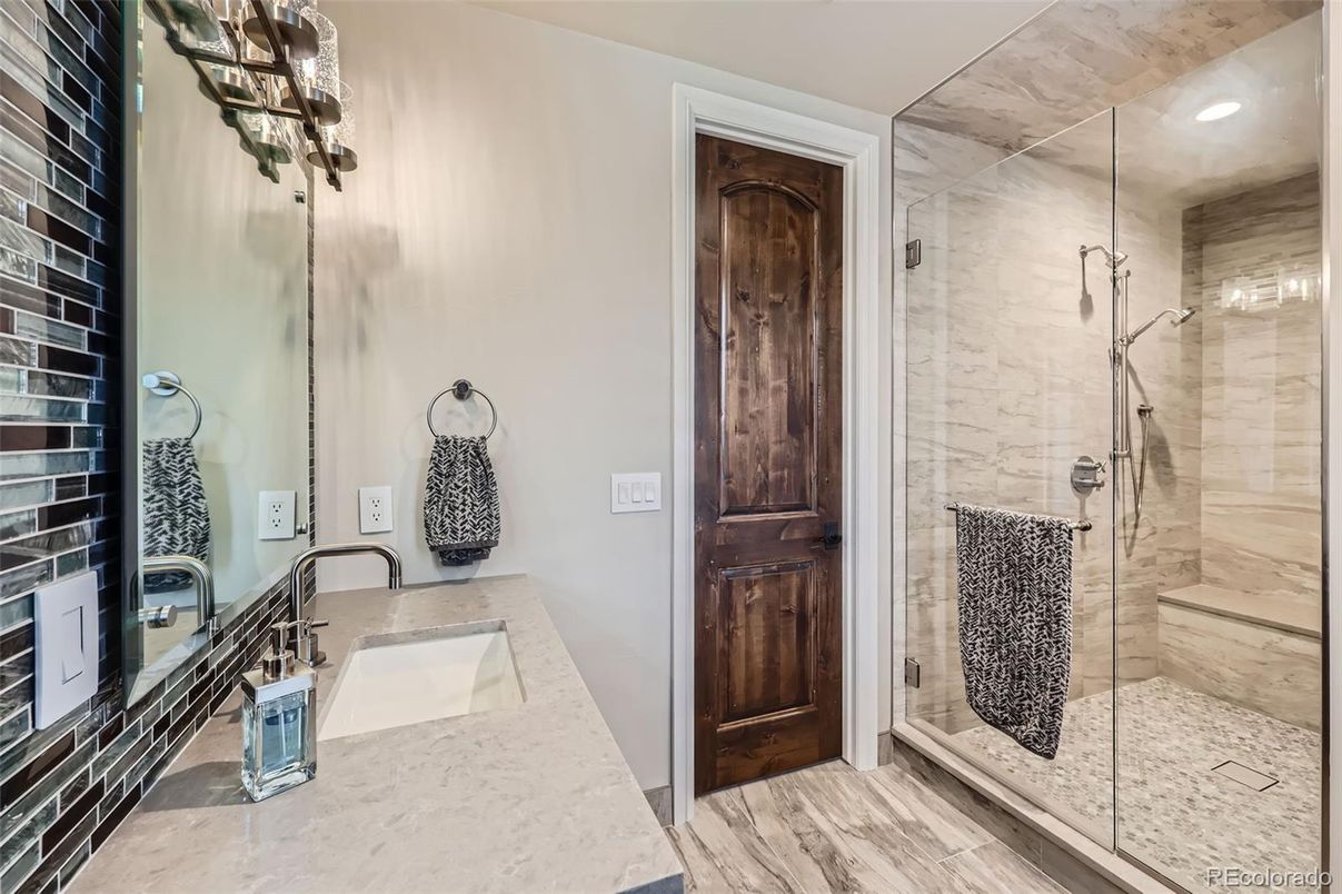 Bathroom, Glass Shower, Interior, Marble Walls, Recessed Lighting, Wood Texture Flooring