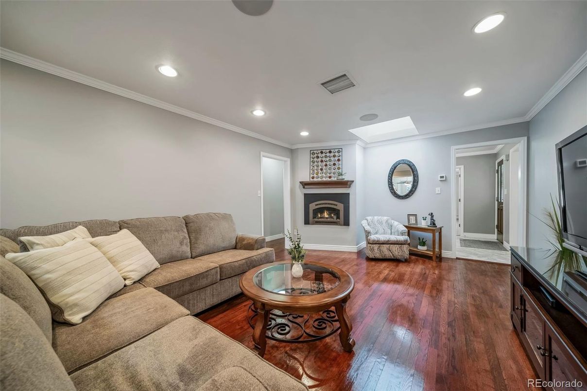 Fireplace, Interior, Living room, Recessed Lighting, Wood Texture Flooring