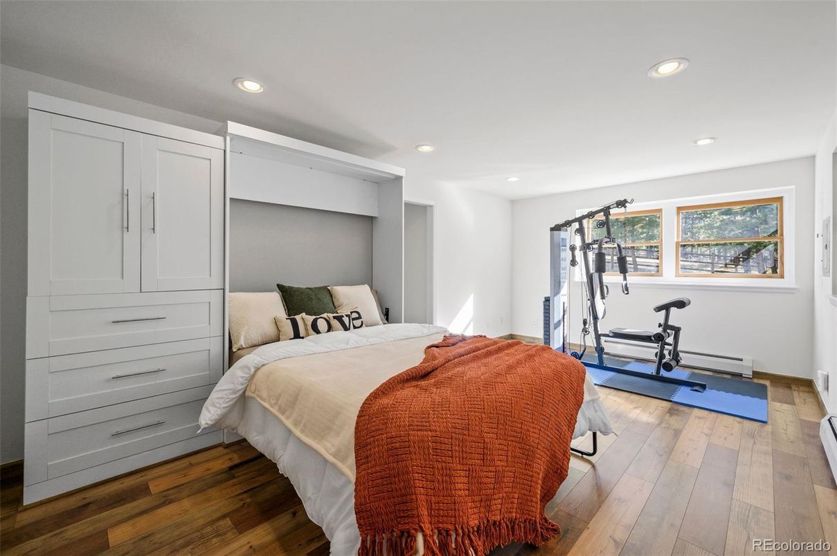 Bedroom, Fitness Equipment, Interior, Recessed Lighting, Wood Texture Flooring
