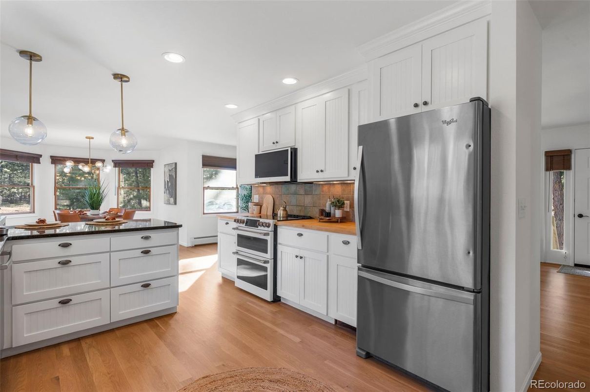 Interior, Kitchen, Pendant Lights, Recessed Lighting, Stainless Steel Appliances, Wood Texture Flooring
