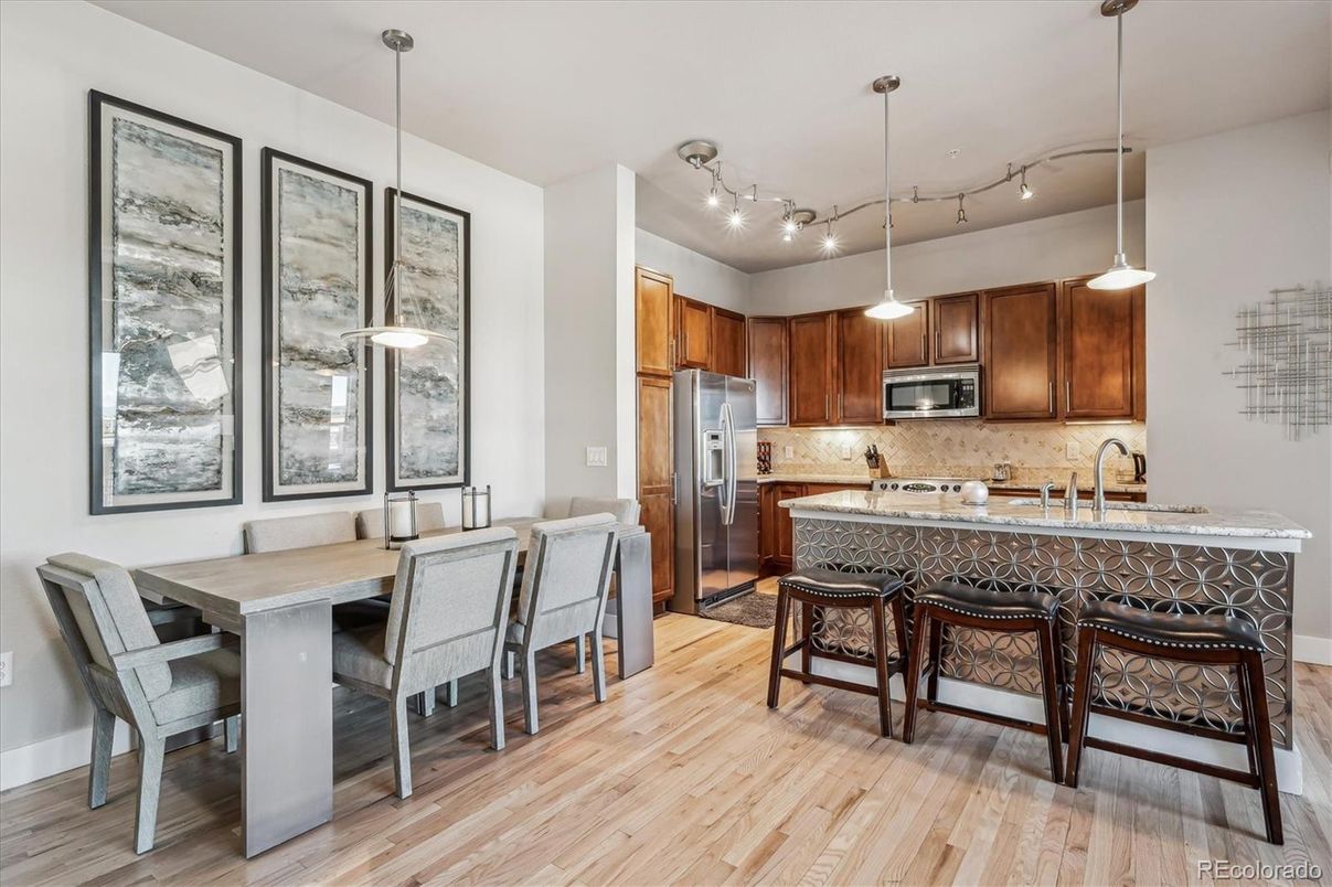 Dining room, Interior, Kitchen, Pendant Lights, Stainless Steel Appliances, Wood Texture Flooring