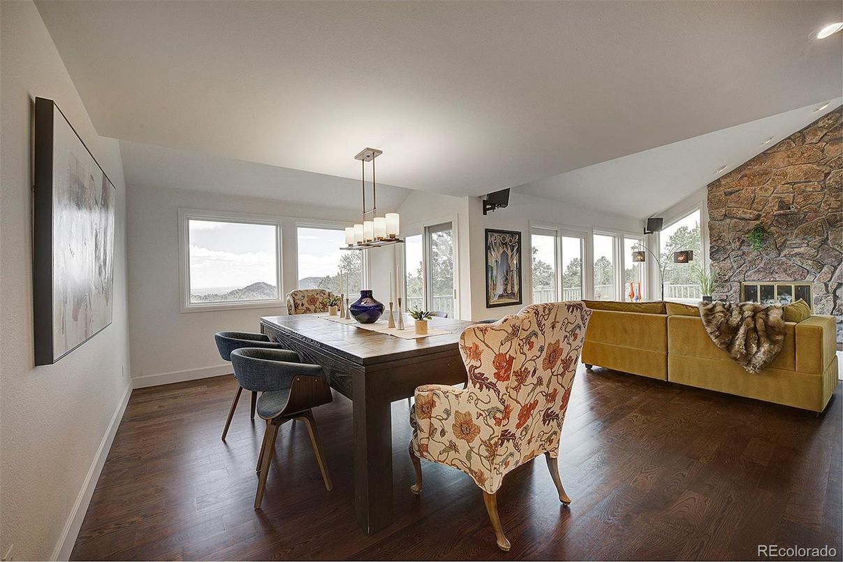 Chandelier, Dining room, Fireplace, Interior, Living room, Stone Walls, Wood Texture Flooring