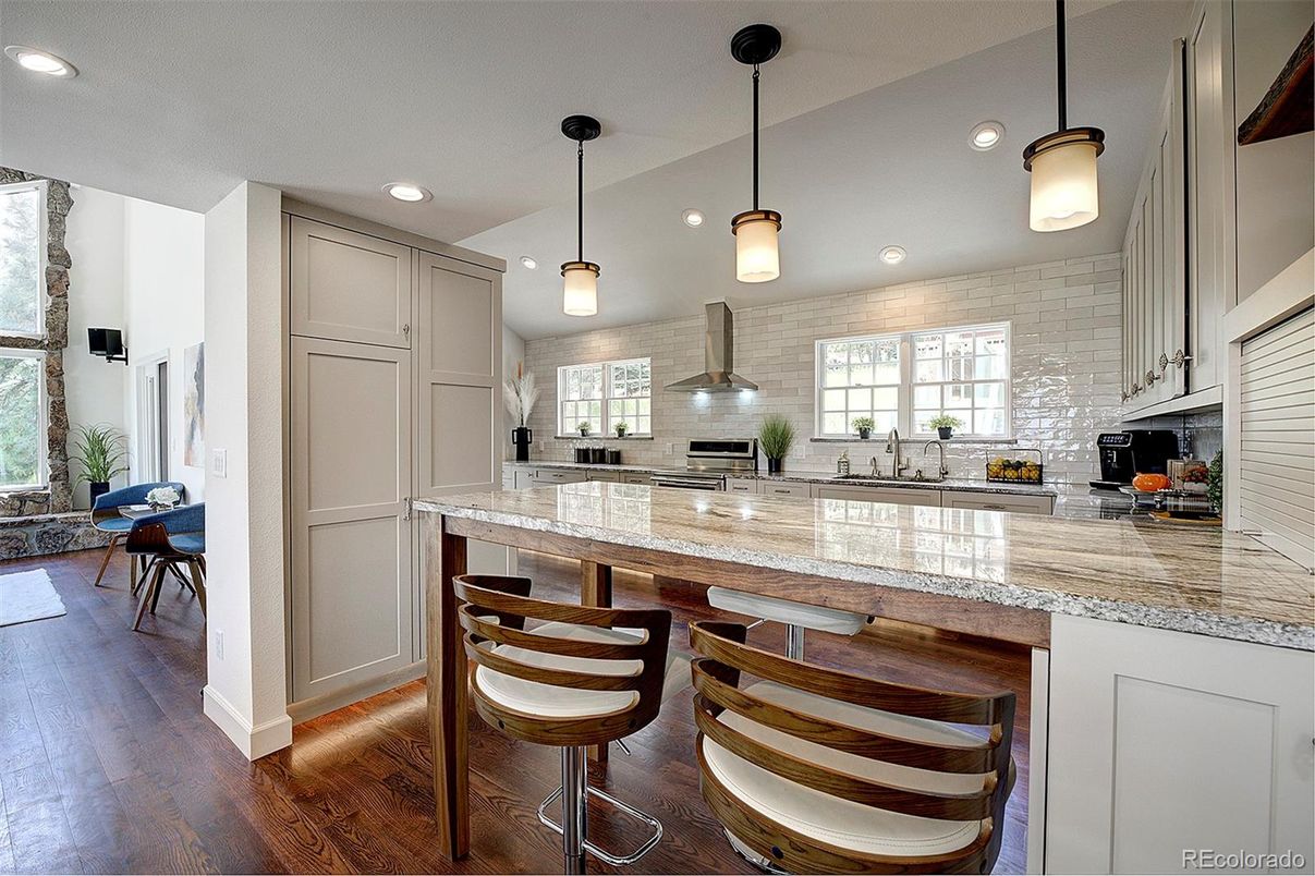 Interior, Kitchen, Pendant Lights, Recessed Lighting, Stainless Steel Appliances, Stone Walls, Wood Texture Flooring