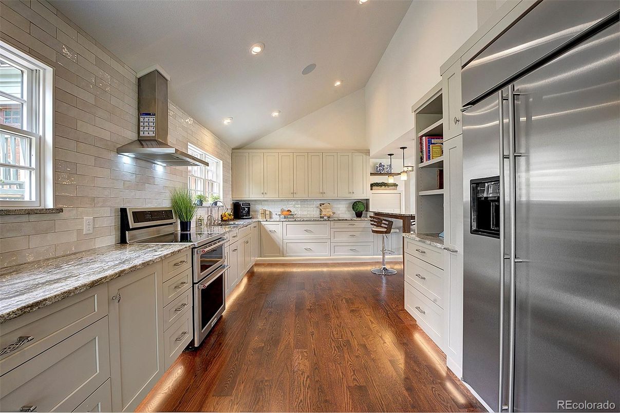 Interior, Kitchen, Pendant Lights, Recessed Lighting, Stainless Steel Appliances, Stone Walls, Wood Texture Flooring