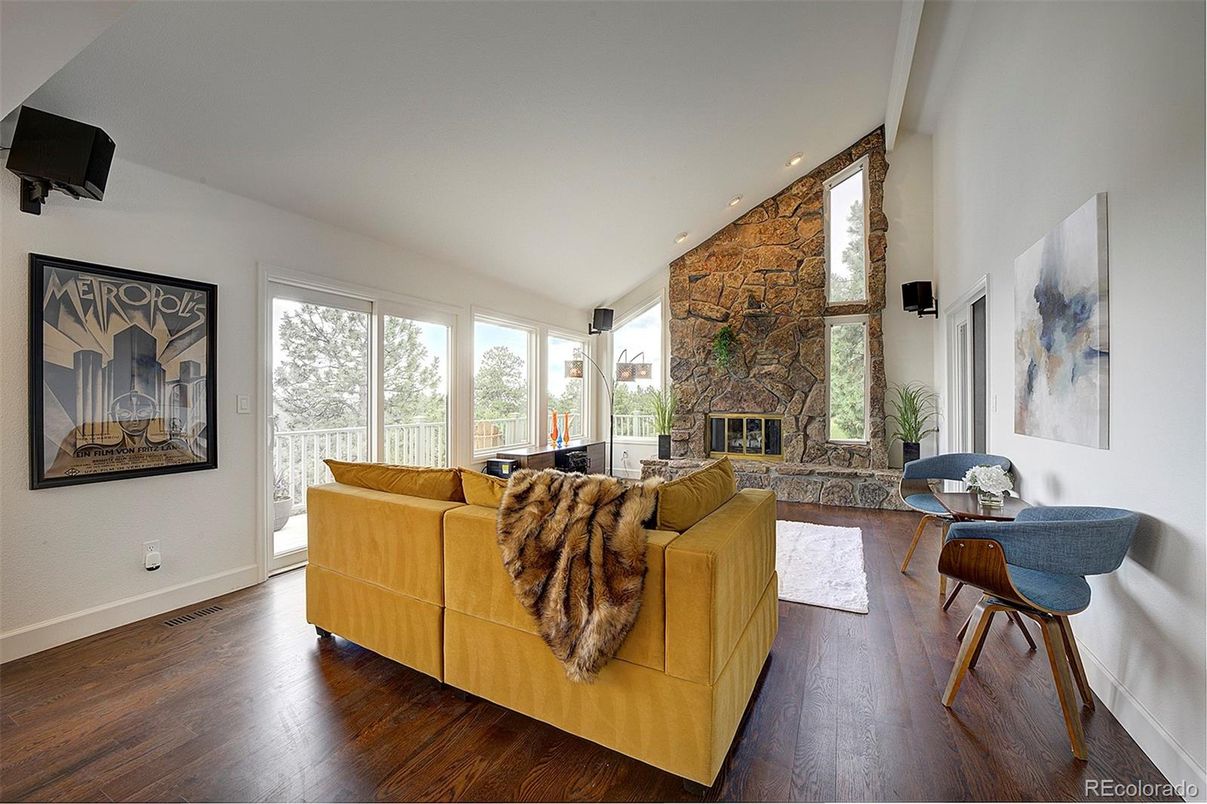 Fireplace, Interior, Living room, Recessed Lighting, Stone Walls, Wood Texture Flooring