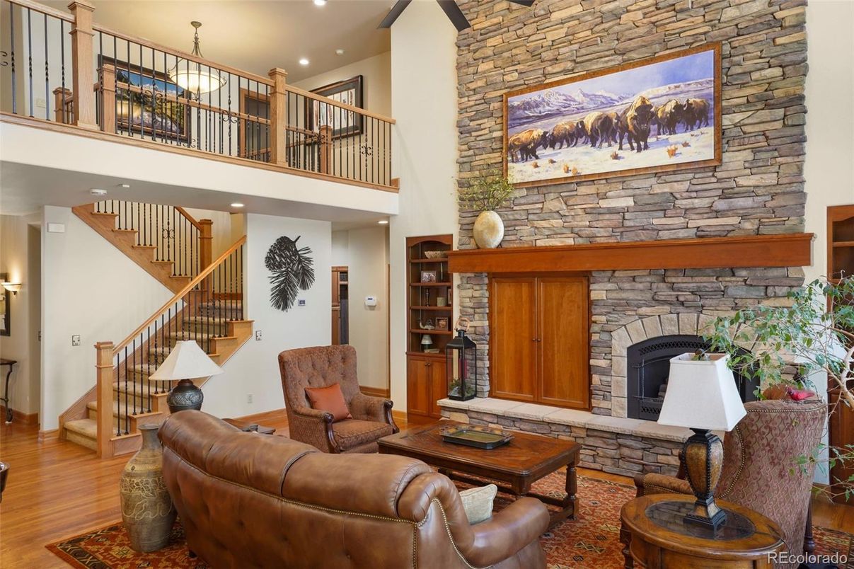 Fireplace, Interior, Living room, Recessed Lighting, Stone Walls, Wood Texture Flooring