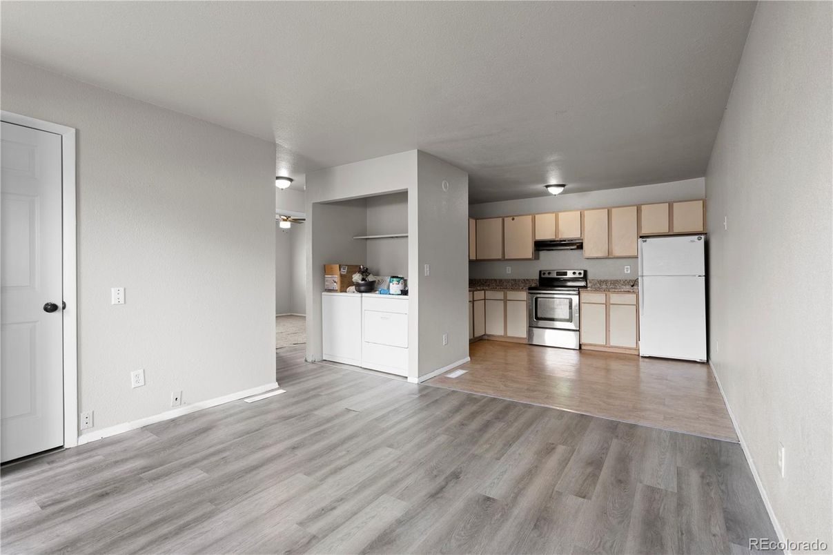 Empty room, Interior, Kitchen, Stainless Steel Appliances, Wood Texture Flooring
