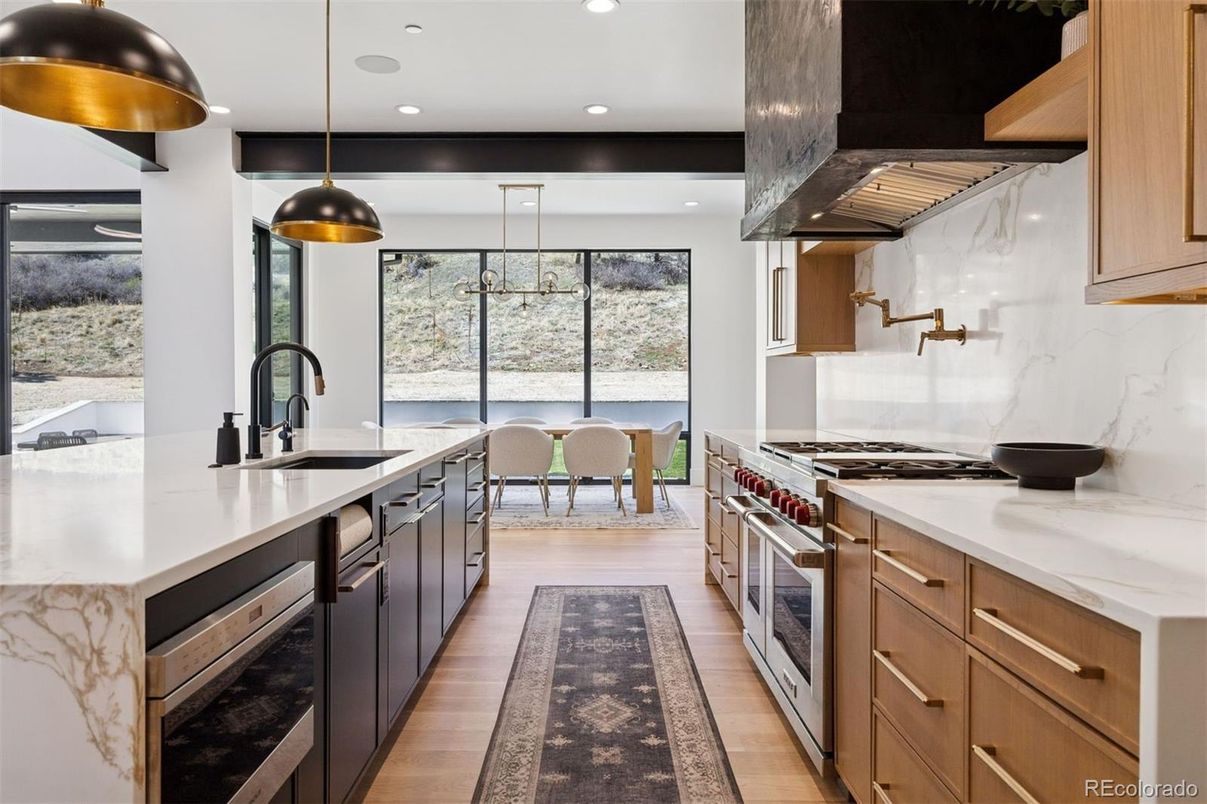 Dining room, Interior, Kitchen, Pendant Lights, Recessed Lighting, Stainless Steel Appliances, Wood Texture Flooring