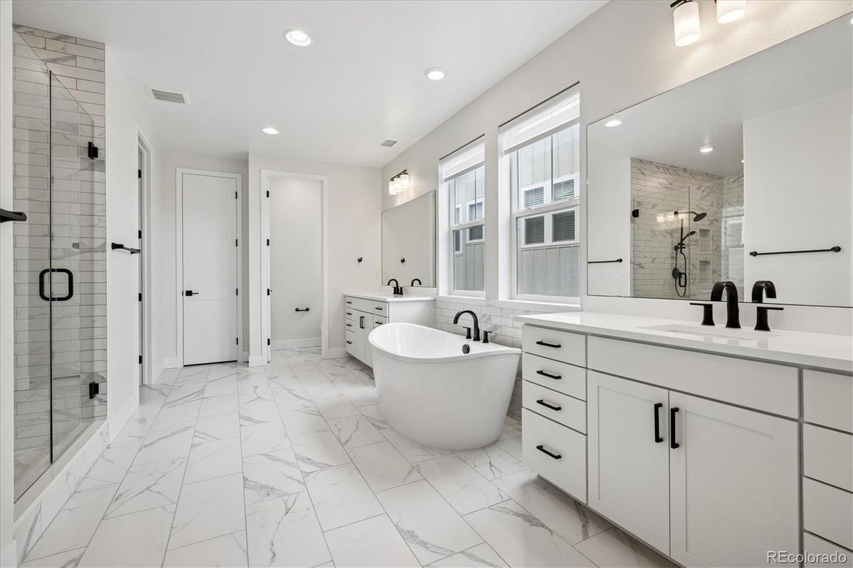 Bathroom, Dual Sink Vanities, Free Standing Baths, Glass Shower, Interior, Marble, Recessed Lighting
