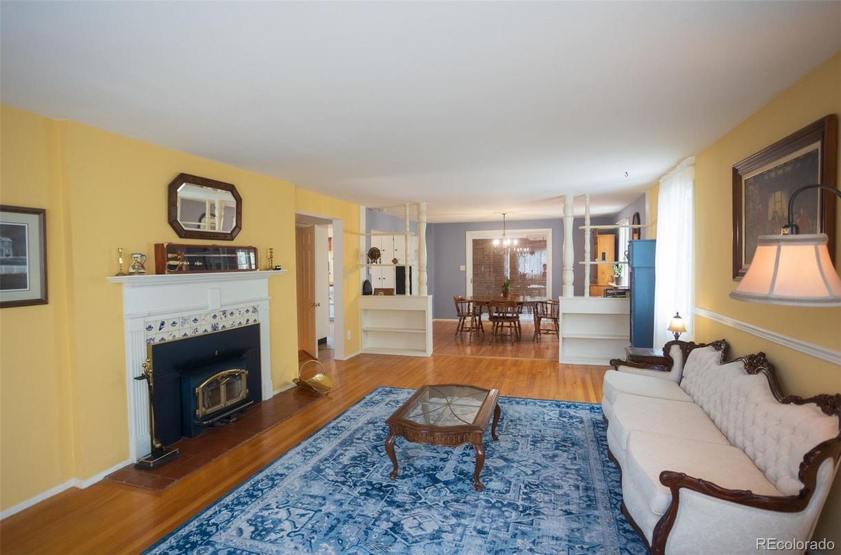 Chandelier, Dining room, Fireplace, Interior, Living room, Pendant Lights, Wood Texture Flooring