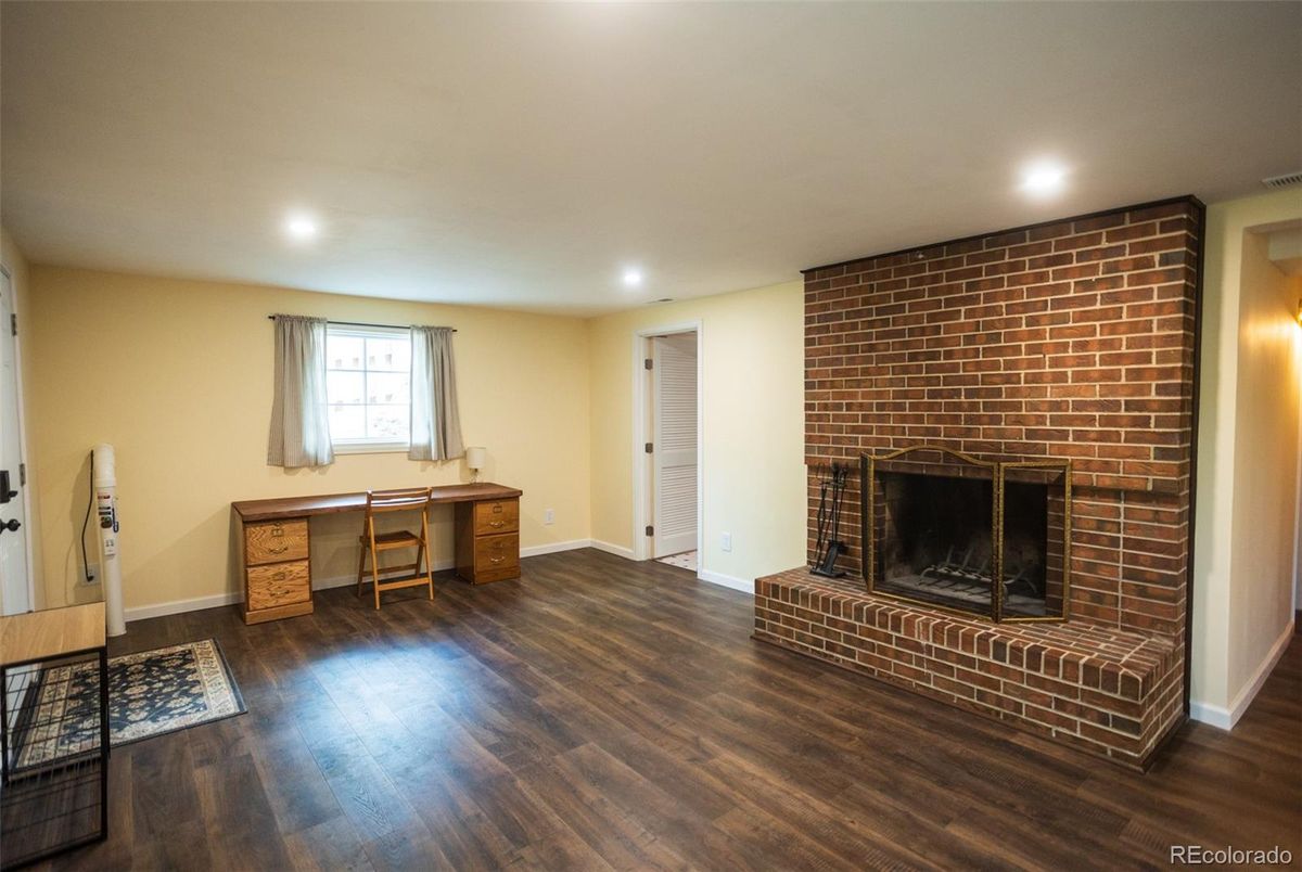 Fireplace, Interior, Recessed Lighting, Stone Walls, Wood Texture Flooring
