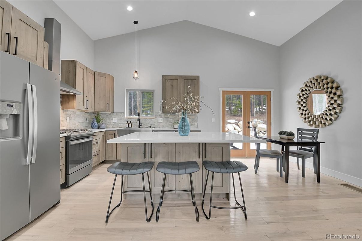 Dining room, Interior, Kitchen, Pendant Lights, Recessed Lighting, Stainless Steel Appliances, Wood Texture Flooring