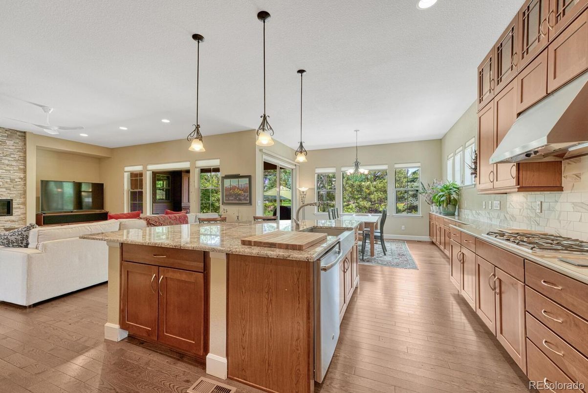 Dining room, Interior, Kitchen, Living room, Pendant Lights, Recessed Lighting, Stainless Steel Appliances, Wood Texture Flooring