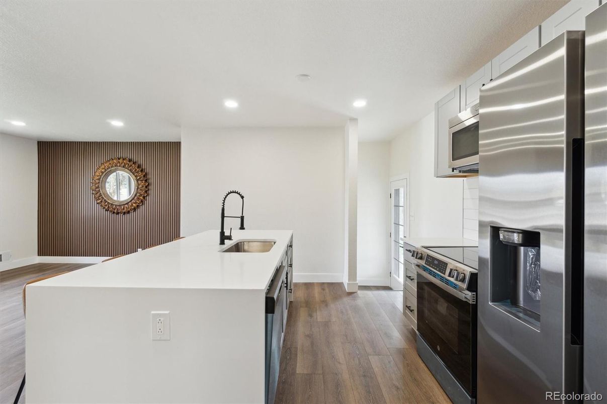 Interior, Kitchen, Recessed Lighting, Stainless Steel Appliances, Wood Texture Flooring
