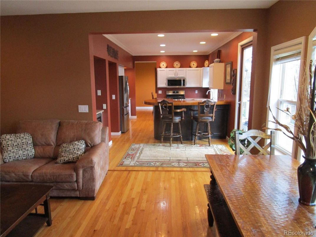 Dining room, Interior, Kitchen, Living room, Recessed Lighting, Stainless Steel Appliances, Wood Texture Flooring