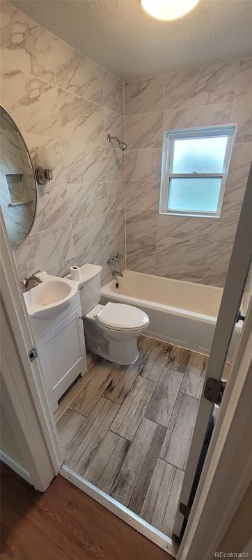 Bathroom, Dual Sink Vanities, Interior, Marble Walls, Wood Texture Flooring