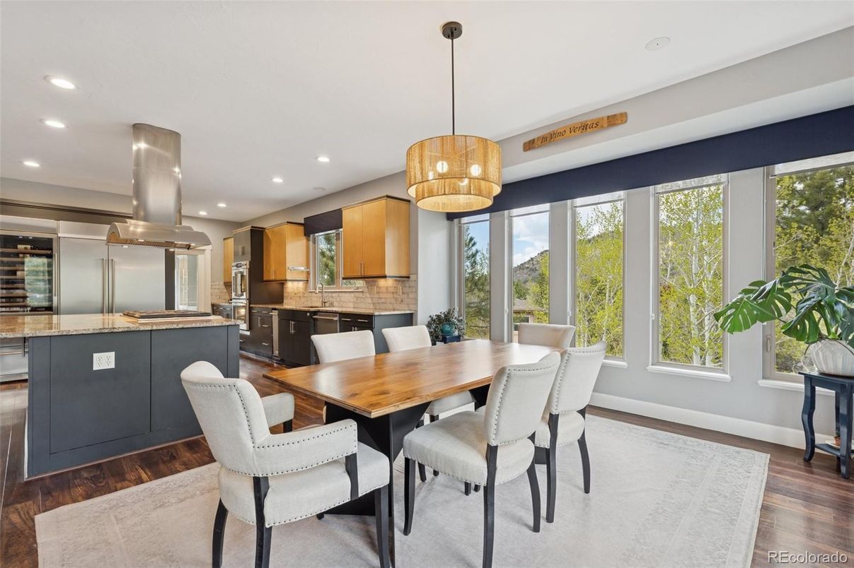 Dining room, Interior, Kitchen, Pendant Lights, Recessed Lighting, Stainless Steel Appliances, Wood Texture Flooring