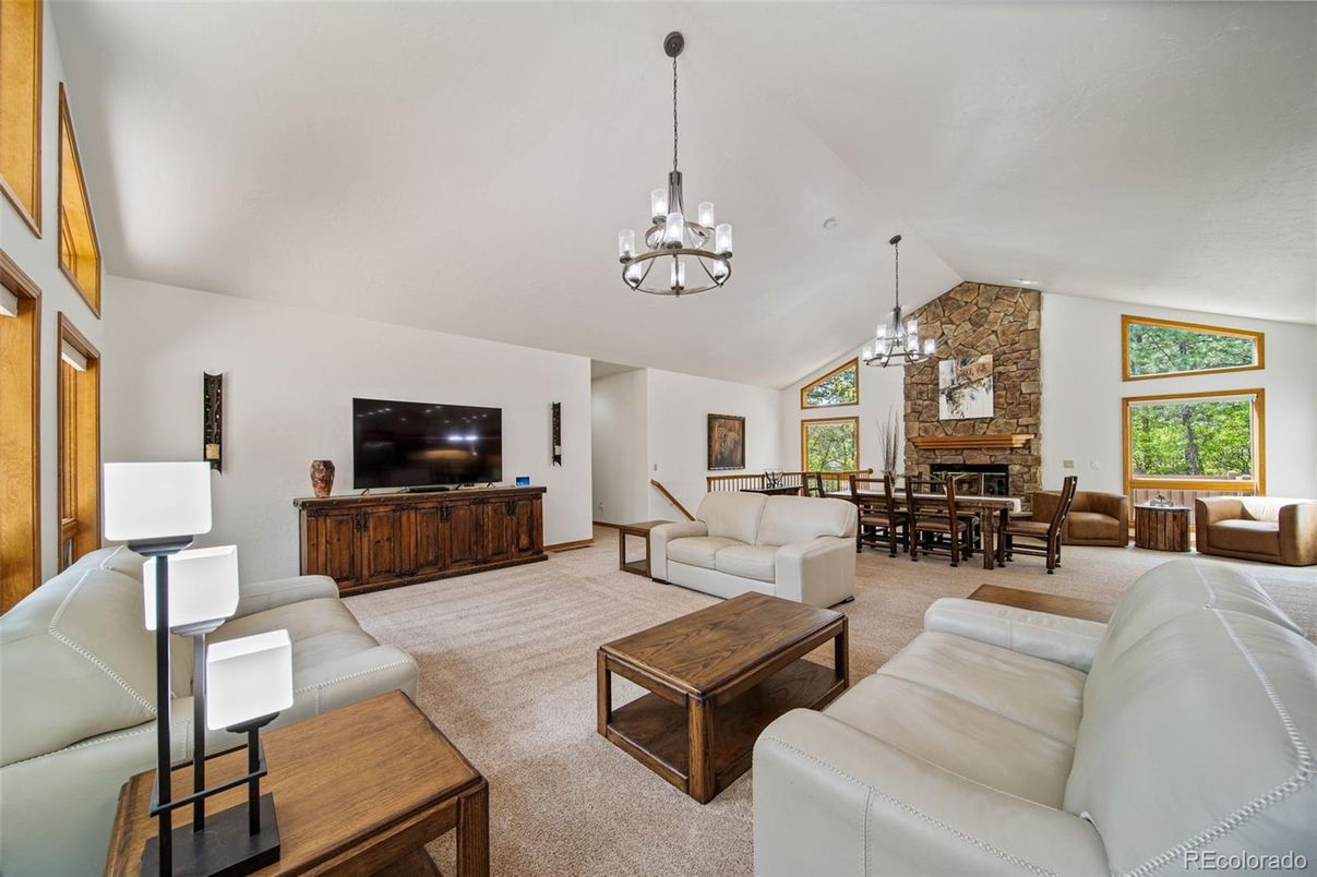 Chandelier, Dining room, Fireplace, Interior, Living room, Stone Walls