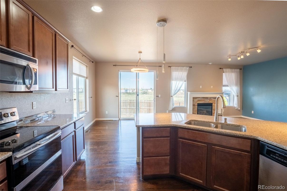 Fireplace, Interior, Kitchen, Pendant Lights, Recessed Lighting, Wood Texture Flooring