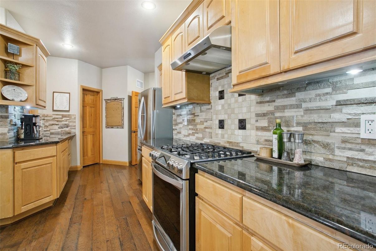 Interior, Kitchen, Recessed Lighting, Stainless Steel Appliances, Stone Walls, Wood Texture Flooring
