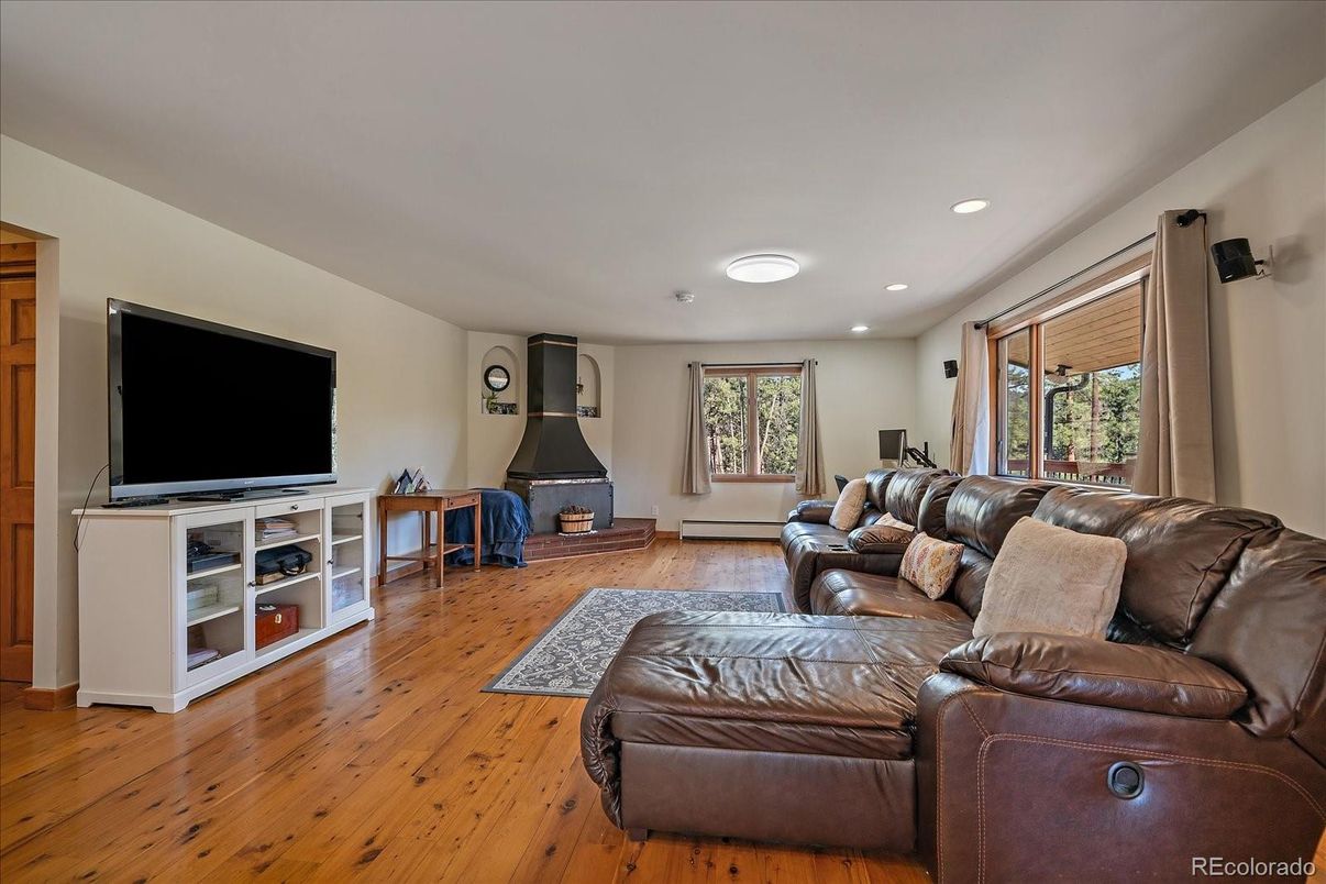 Fireplace, Interior, Living room, Recessed Lighting, Wood Texture Flooring
