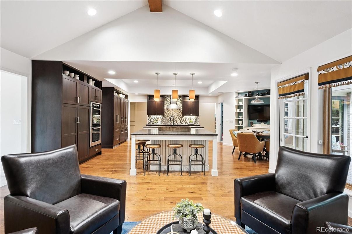 Dining room, Interior, Kitchen, Pendant Lights, Recessed Lighting, Stainless Steel Appliances, Wooden Beams, Wood Texture Flooring