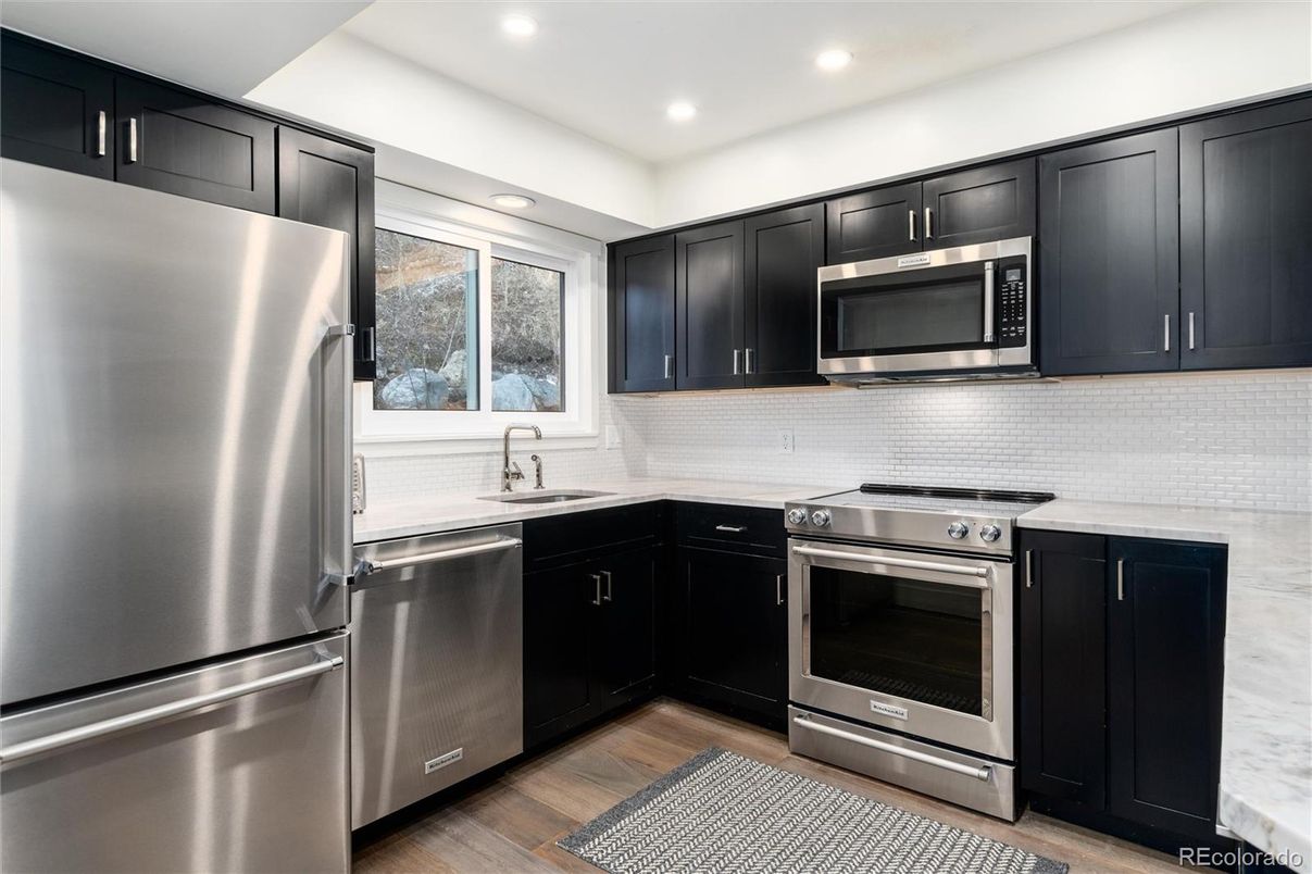 Interior, Kitchen, Recessed Lighting, Stainless Steel Appliances, Wood Texture Flooring