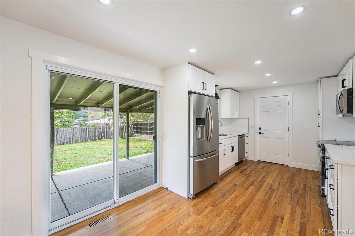 Interior, Kitchen, Recessed Lighting, Stainless Steel Appliances, Wood Texture Flooring