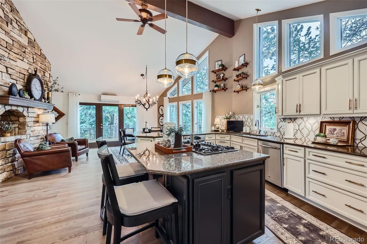 Chandelier, Dining room, Fireplace, Interior, Kitchen, Living room, Pendant Lights, Stone Walls, Wooden Beams, Wood Texture Flooring